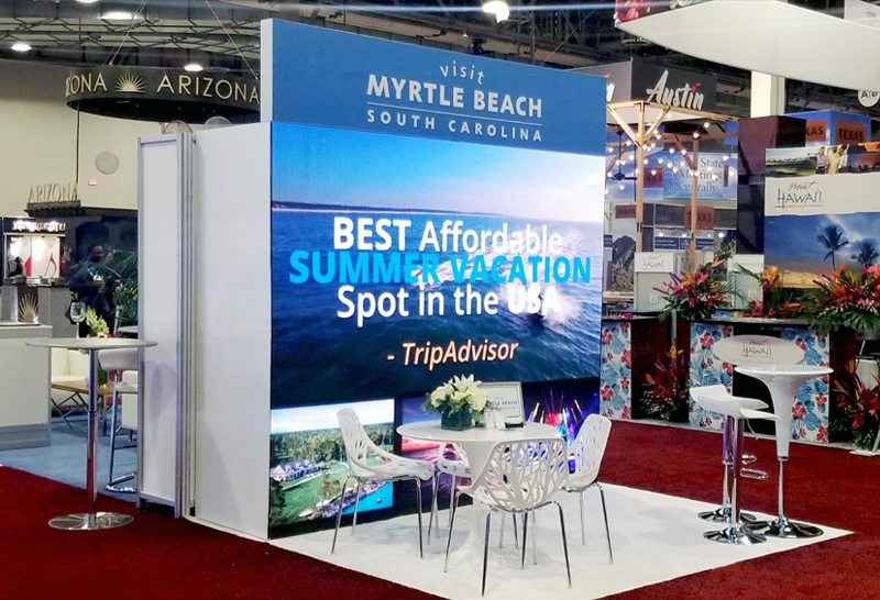 10x10 trade show booth with LED video wall and header sign by ICE Creative LED