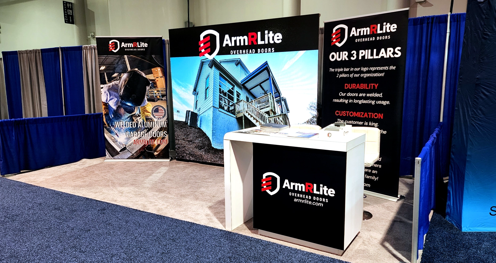 20x10 trade show exhibit with oversized LED video wall, branded reception counter, product graphics and open aisle space