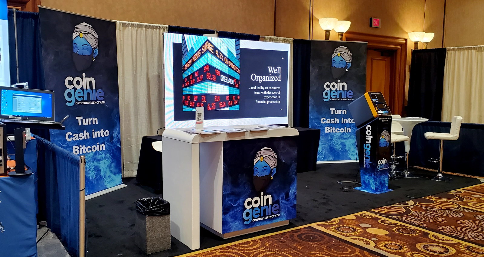 20x10 product demo trade show booth with LED video wall, branded counter, tabletop display and visitor engagement space